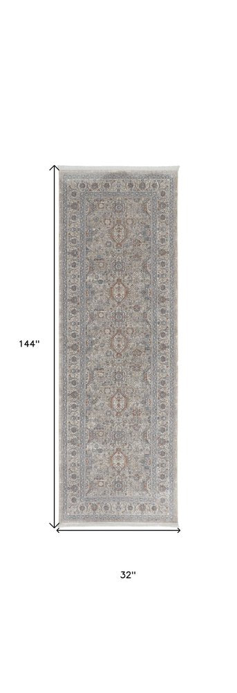 7' X 10' Silver Taupe and Blue Oriental Power Loom Worn Faded Area Rug With Fringe